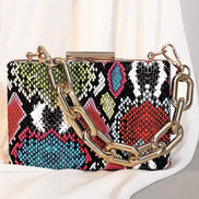 Snake Pattern Handbag & Clutch