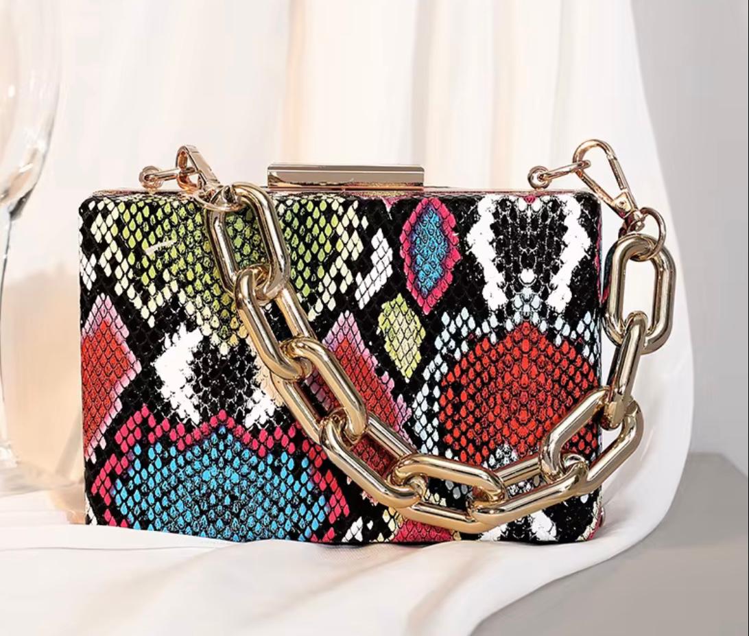 Snake Pattern Handbag & Clutch