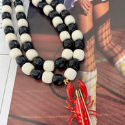 Black and White Beads Necklace with Red Lobster Charm