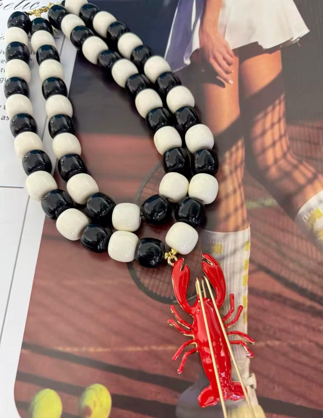 Black and White Beads Necklace with Red Lobster Charm