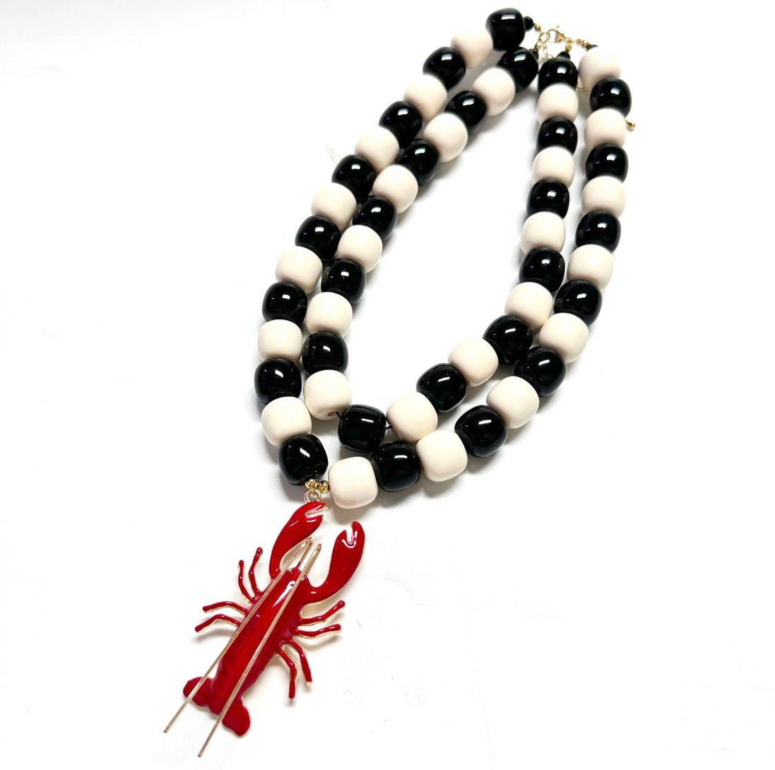 Black and White Beads Necklace with Red Lobster Charm